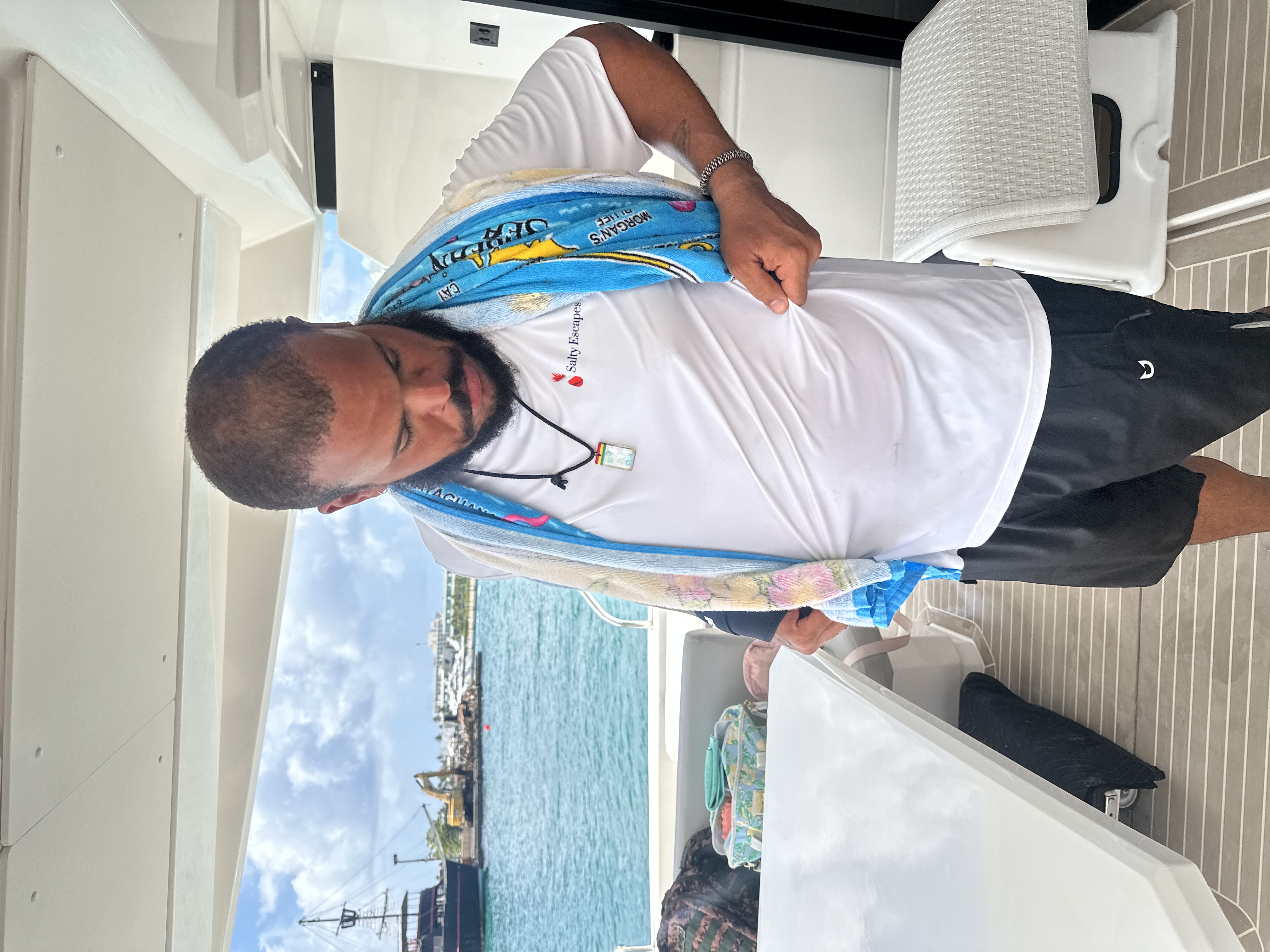 Crew member aboard the yacht in Salty Escapes uniform